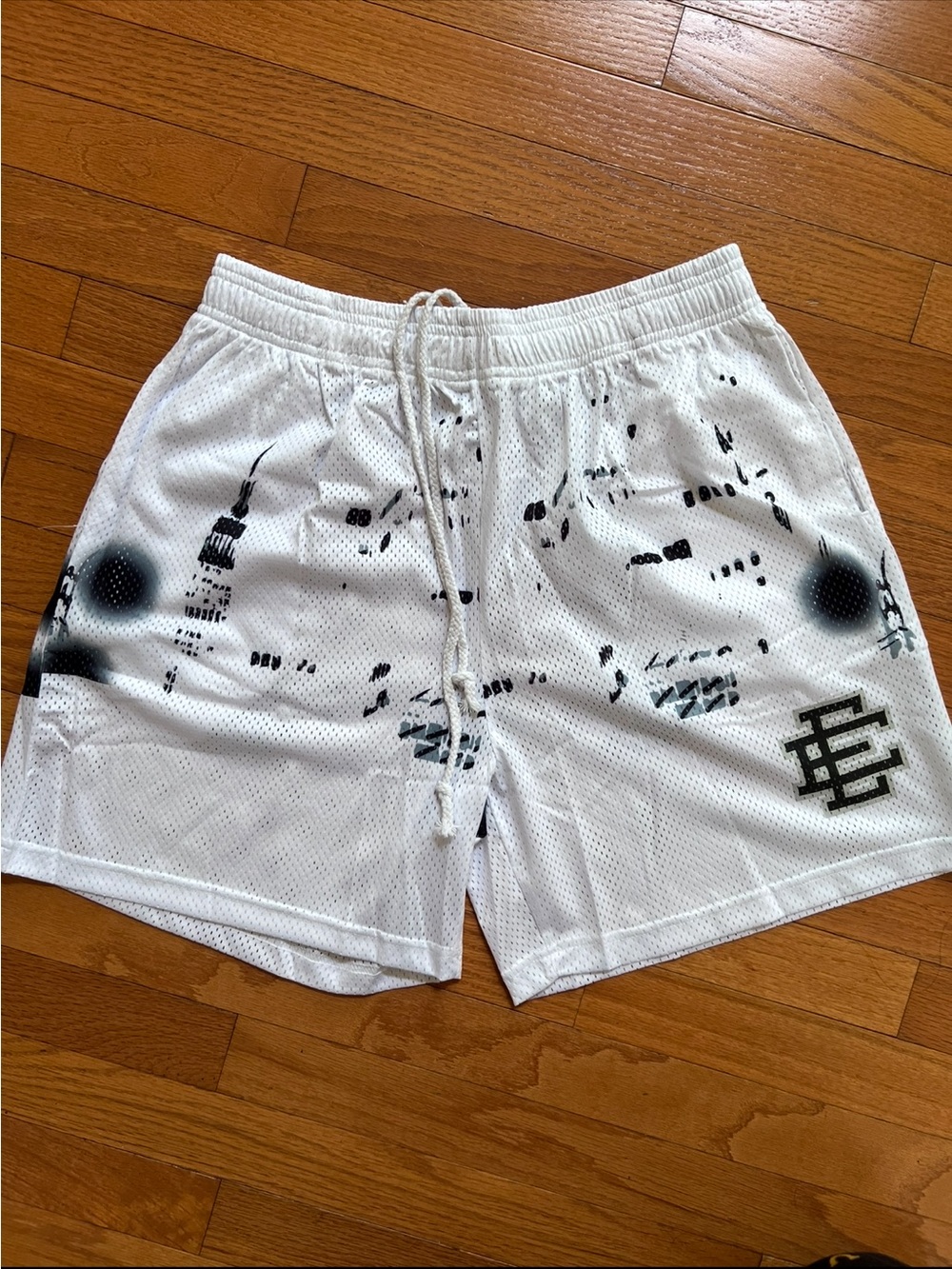 Eric Emanuel Men's White Athletic Mesh Shorts with Black Graphic